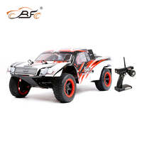 ROVAN 320SC TERMINATOR BAJA 2 STROKE 32cc SHORT COURSE TRUCK 5B CONVERTED TO 5T BODY WITH RED AND BLACK AND WHITE READY TO RUN GAS POWERED RC CAR