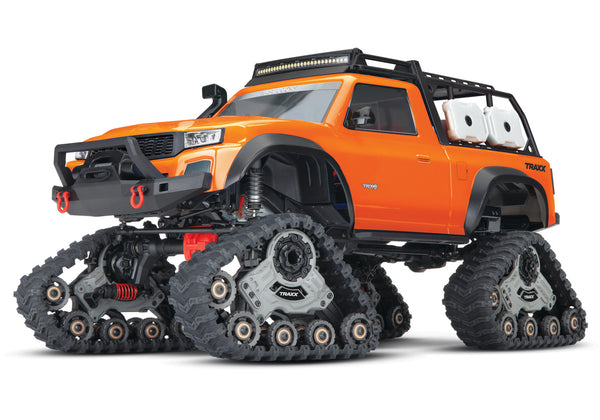 TRAXXAS 82034-4 TRX-4 1/10 EQUIPPED WITH TRAXX AND 4 WHEELS/TIRES ORANGE - BATTERY AND CHARGER NOT INCLUDED