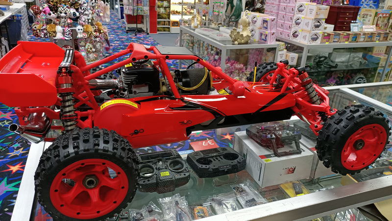 ROVAN 320C03 BODY 09 RED 32CC BAJA WITH DOMINATOR EXHAUST PIPE FLYSKY GT3 CONTROLLER 2.4GHZ READY TO RUN TWO STROKE POWERED RC CAR NOW WITH SYMETRICAL STEERING
